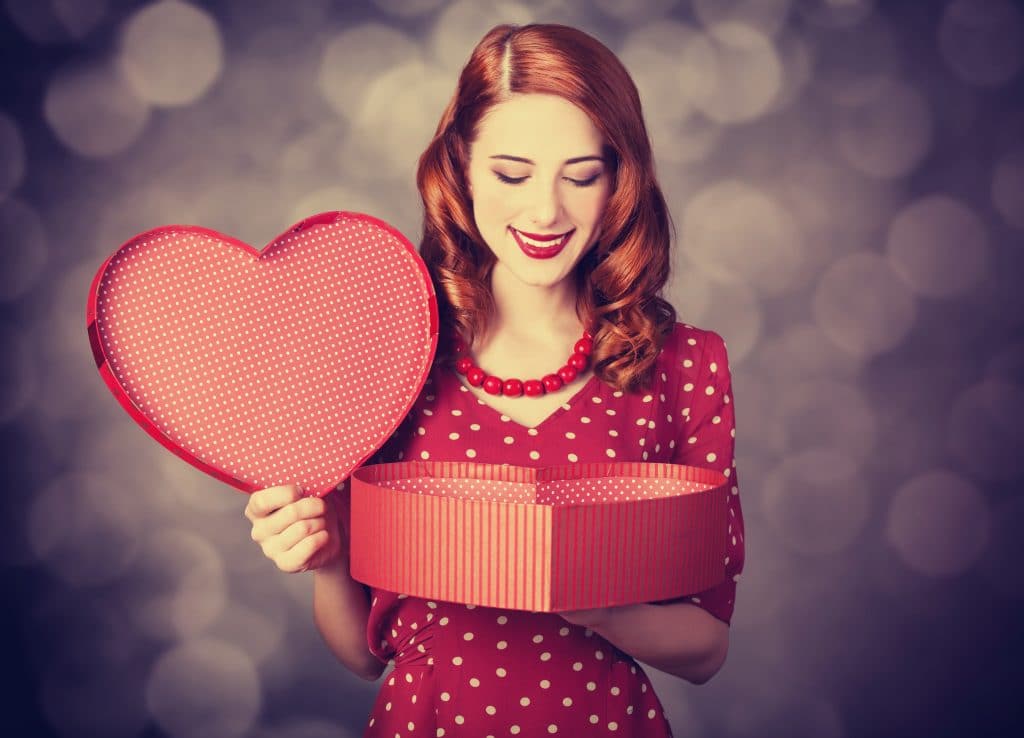 Redhead Girl With Gift For Valentines Day