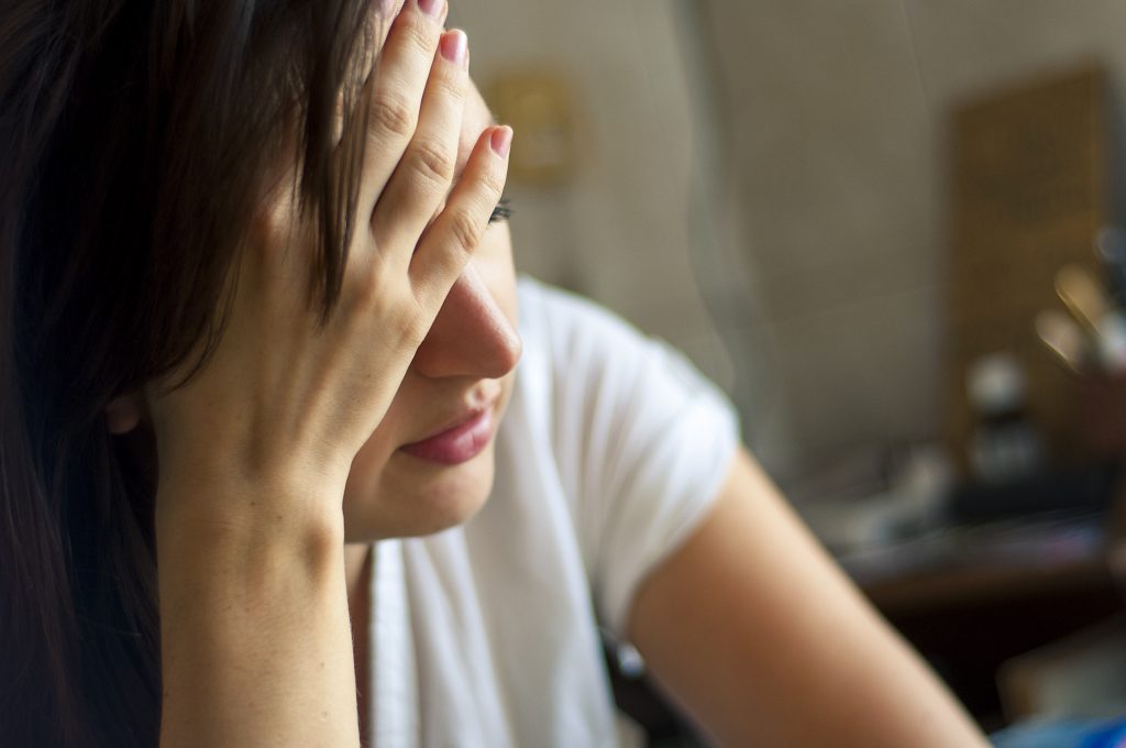 An Image Of Girl With Headache