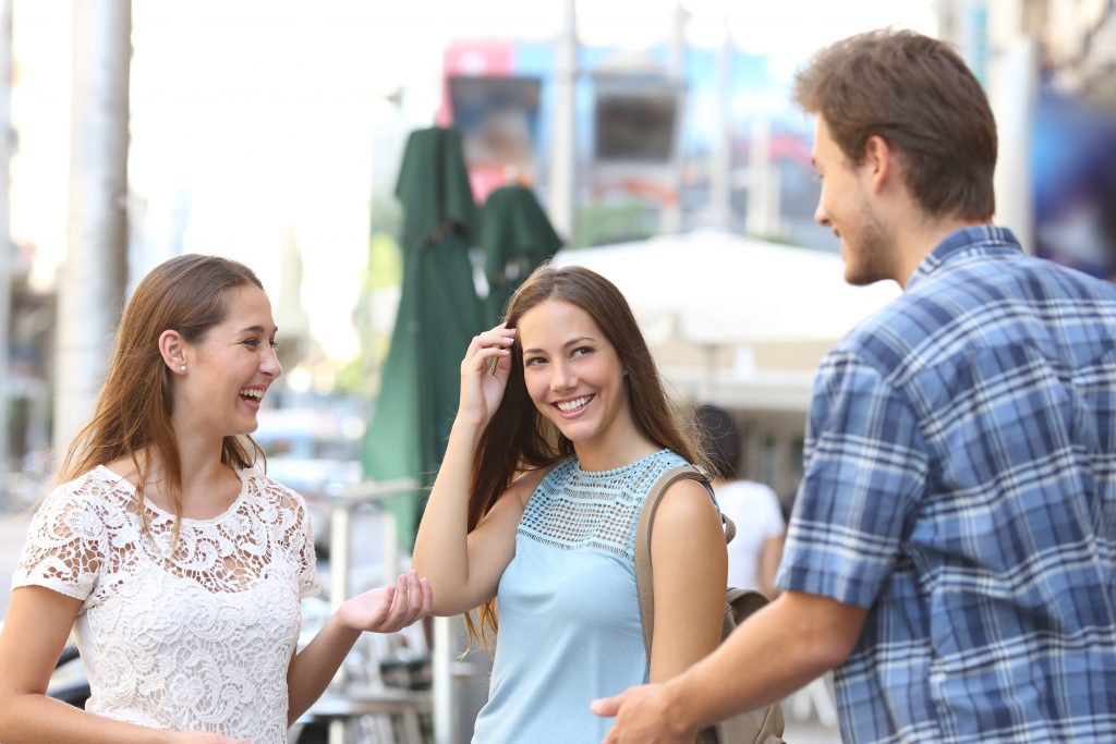 Candid Girl With A Friend Flirting With A Boy