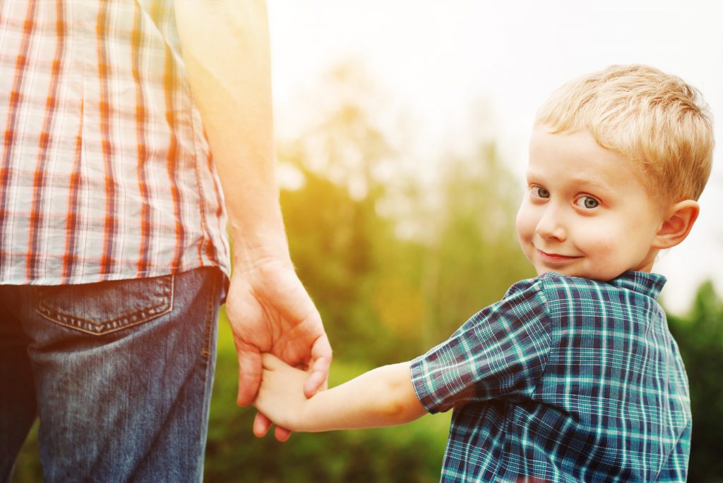 Father And Son Holding Hands