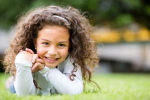 Happy Little Girl Having Fun At The Park