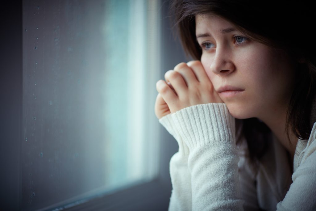 Sad Girl Near Window Thinking About Something