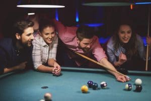 Group Playing Pool